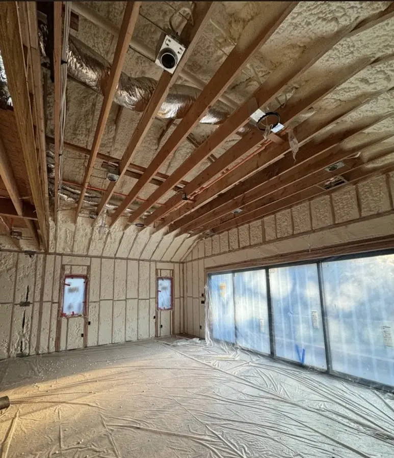 Interior walls and ceiling insulated with spray foam during new construction in West Whittier-Los Nietos